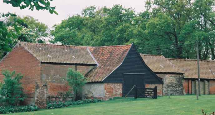 Former All Saints. Note the mighty buttress (left) and flint expanse right beyond the modern extension.