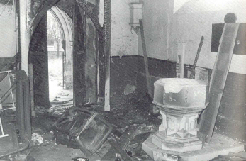 The interior gutted by fire in 1977, shortly before demolition. 